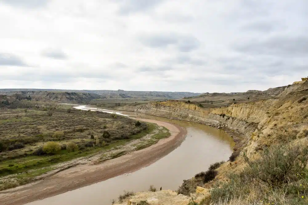 Make the most of your one day visit to Theodore Roosevelt National Park. Teddy Roosevelt National Park is the only national park in North Dakota but its badlands and wildlife is one not to be missed. Check out how to spend one day in Theodore Roosevelt National Park