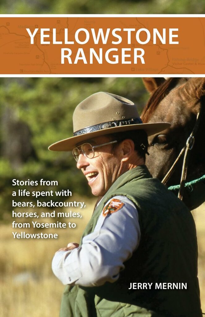 Yellowstone Ranger" by Jerry Mernin: Alt text: "Cover of 'Yellowstone Ranger' featuring a smiling park ranger on horseback, an inspiring collection of stories for fans of Yellowstone Books and wilderness tales.