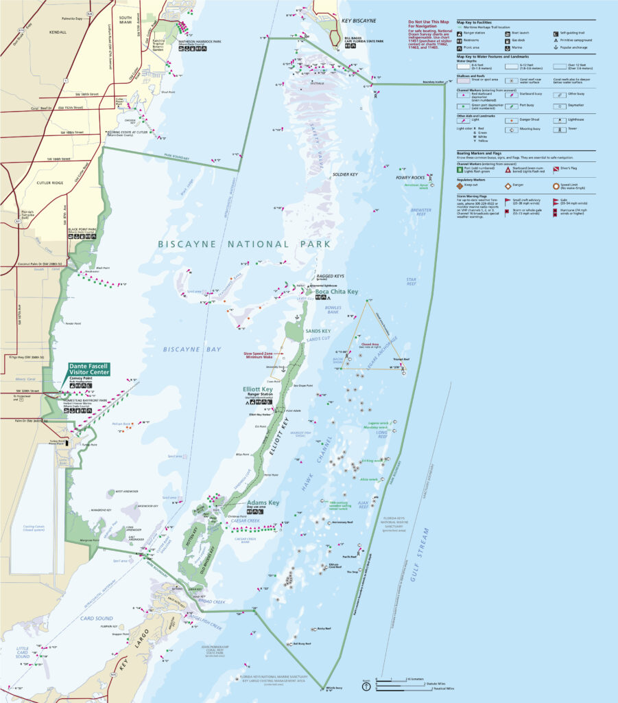 A comprehensive map of Biscayne National Park showing the park's boundaries, islands like Elliott Key, Adams Key, and various water-based recreational spots. The map also includes visitor centers and maritime boundaries.