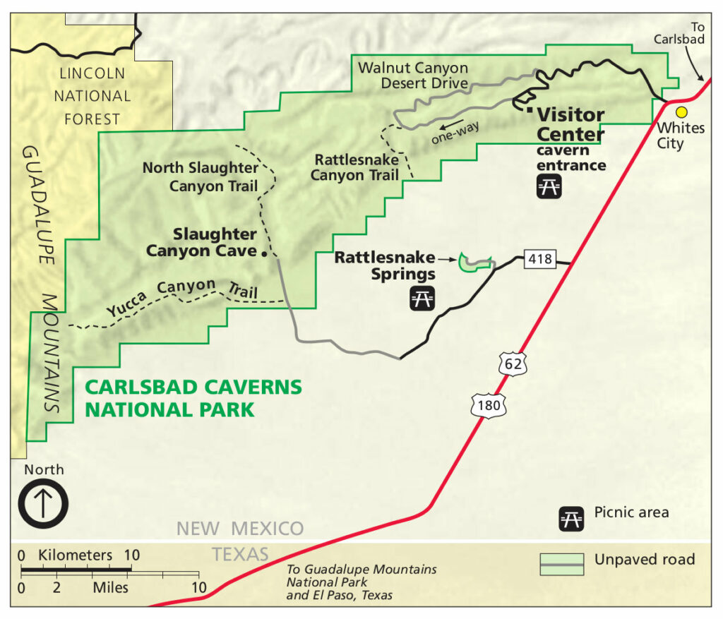 This map of Carlsbad Caverns National Park showcases the visitor center, cavern entrance, and trails like the Walnut Canyon Desert Drive and Rattlesnake Canyon Trail. The map also includes nearby roads and landmarks such as the Guadalupe Mountains and Lincoln National Forest. ​
