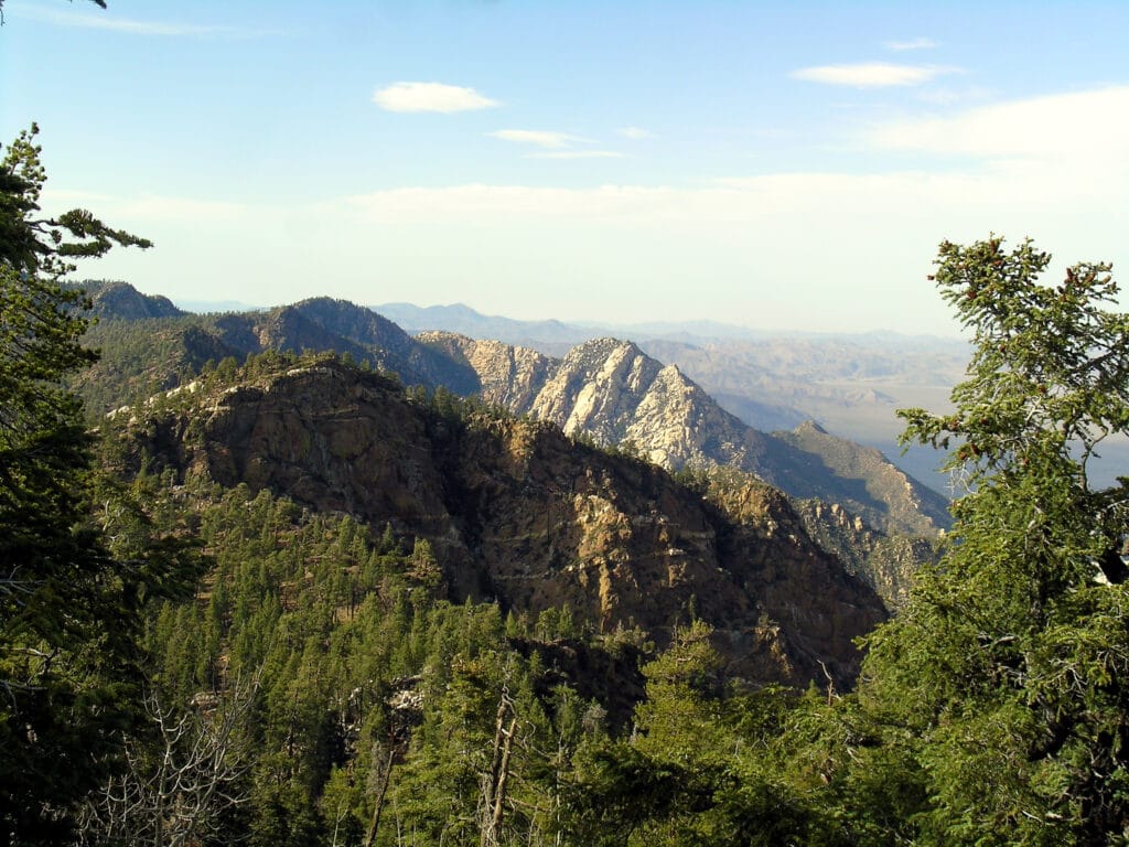 View of rocky outcroppings and rolling hills.