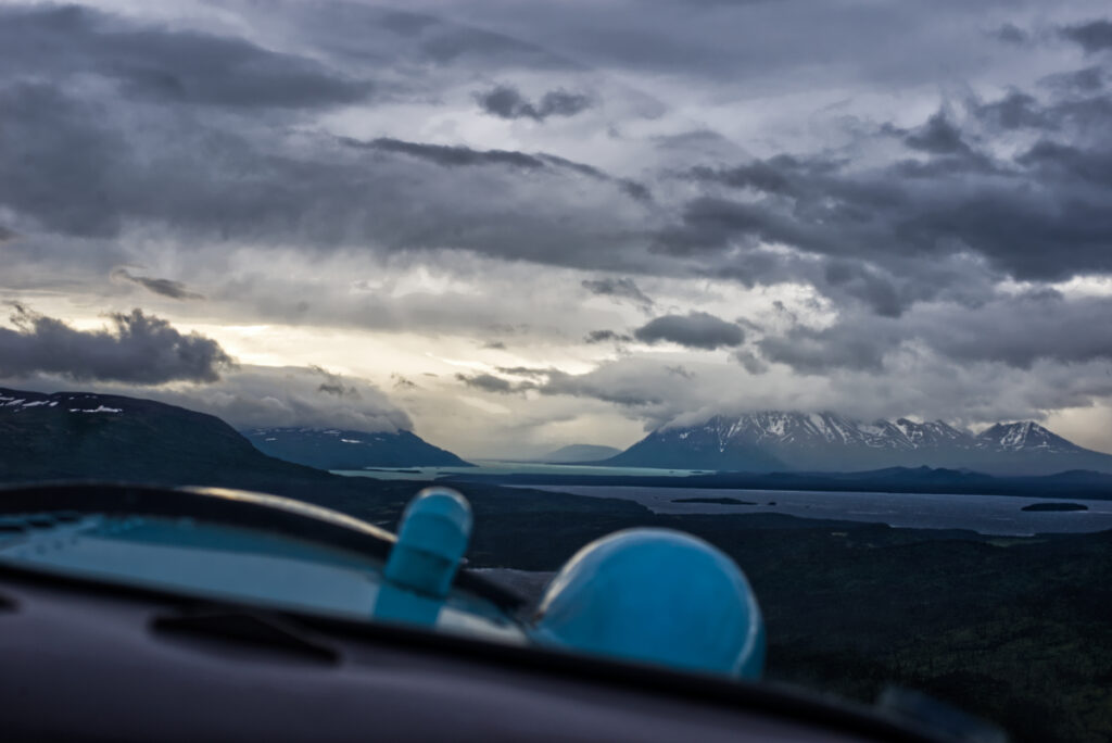 The view out the window of a plane as it flys over Katmai National Park