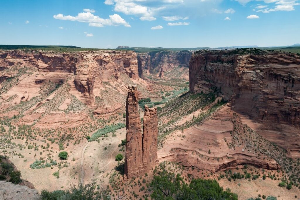 Two rocks fins standing high in the middle of a canyon