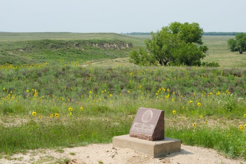 A single gravestone overlooking the area when the US government massacred the Cheyenne and Arapaho people 