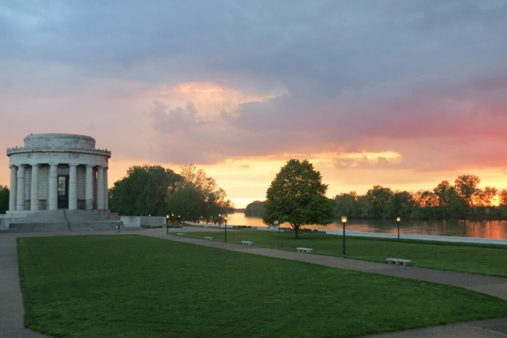 A marble monument at sunset