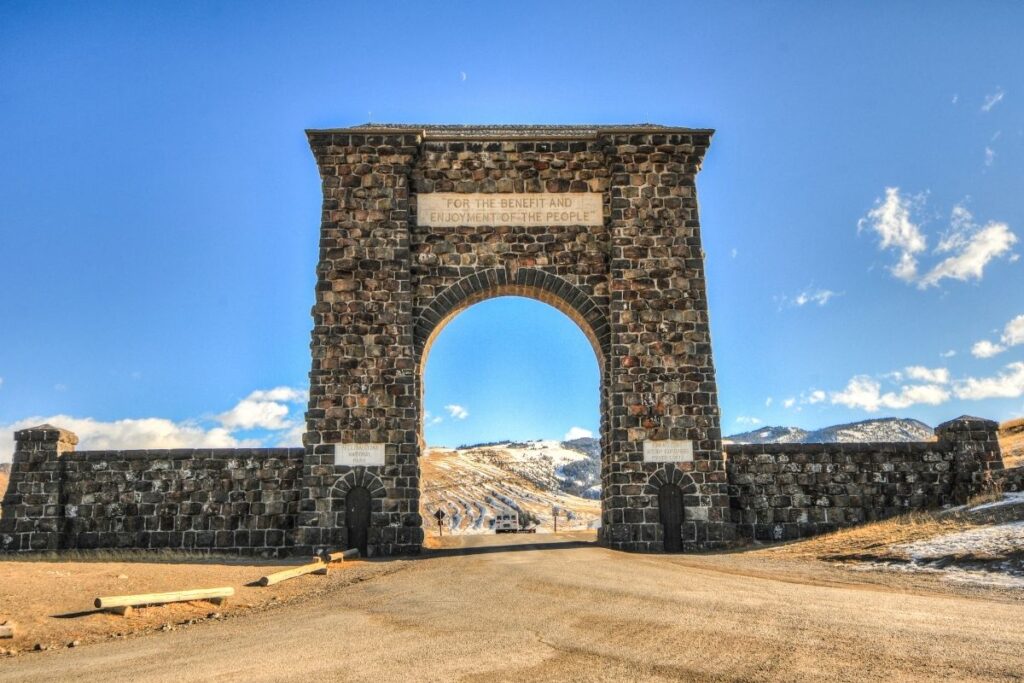 A stone arch that reads for the benefit and enjoyment of the people