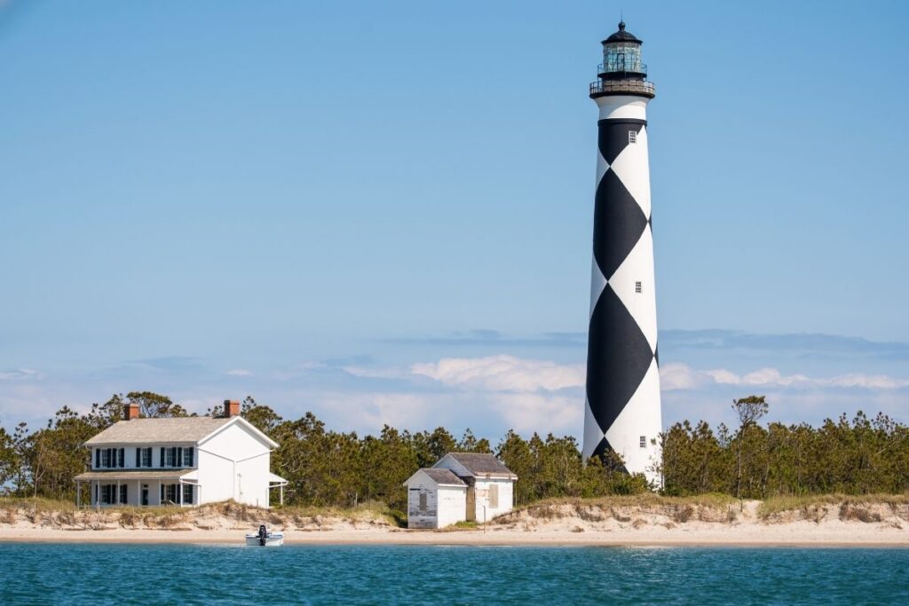 The Black and White diamond lighthouse at Cape Lookout and associated lighthouse buildings.