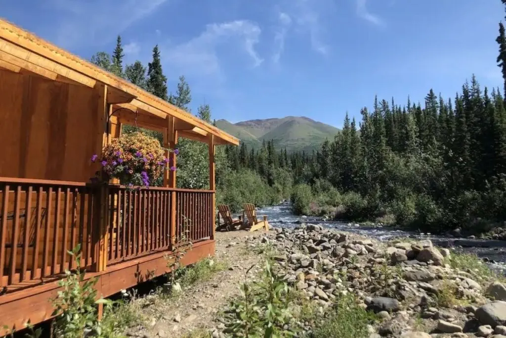 A cabin by a river
