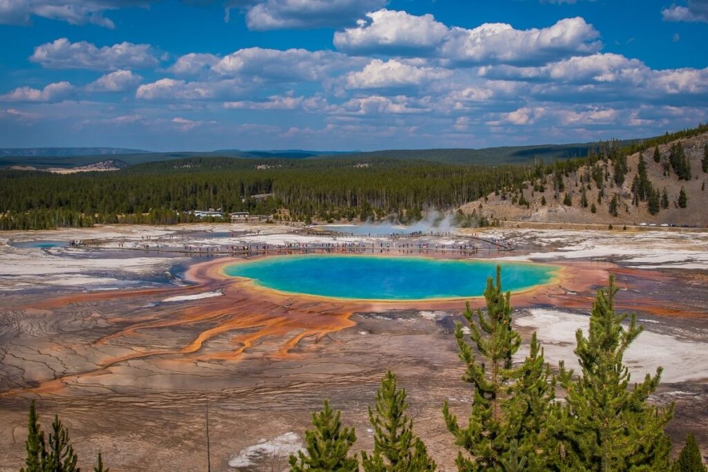 a giant hot spring with bright colors