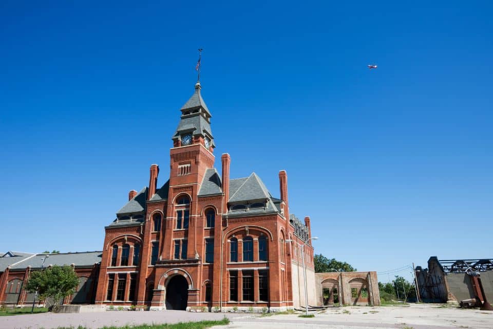 Red brick building with a tall steeple in Pullman National Historical Park 