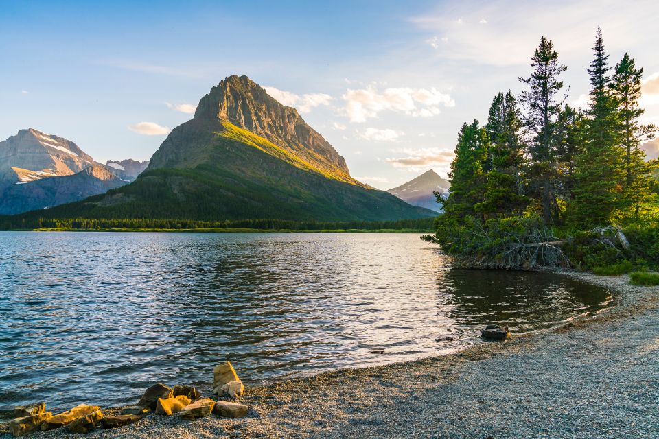 A mountain overlooks a lake