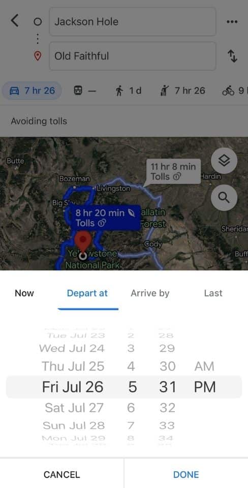 Google Maps navigation window displaying multiple time options for departure or arrival to plan a trip from Jackson Hole to Old Faithful, set against a satellite map background.