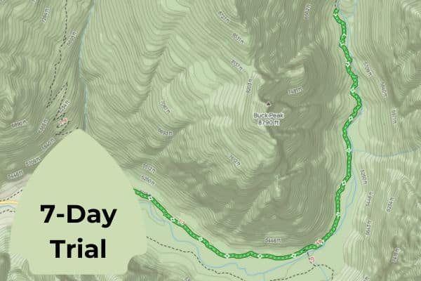 This image features a section of a topographic map showing a portion of a hiking trail marked with a green line, running through mountainous terrain. Key locations like Buck Peak are noted with elevation details. The text "7-Day Trial" is overlaid on the map, suggesting a promotional offer, possibly for a mapping service or app. The overlay partially obscures the map's details but highlights the promotional nature of the graphic.