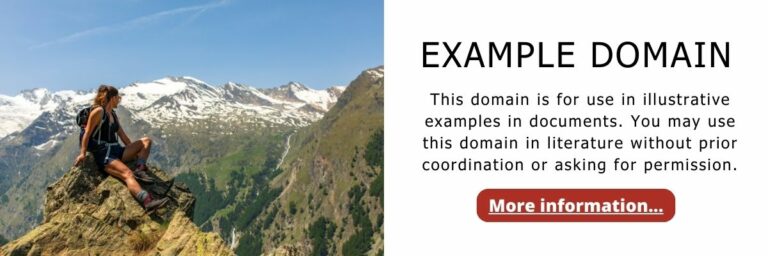 Example Domain banner with a woman hiker sitting on a rocky peak overlooking a mountain range with snowy peaks. Text reads 'Example Domain. This domain is for use in illustrative examples in documents.' and 'More information...