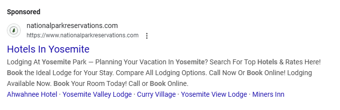 Screenshot of a sponsored Google search ad from nationalparkreservations.com titled “Hotels In Yosemite.” The ad promotes lodging options in Yosemite National Park with links to Ahwahnee Hotel, Yosemite Valley Lodge, Curry Village, Yosemite View Lodge, and Miners Inn, encouraging users to compare rates and book online or by phone.